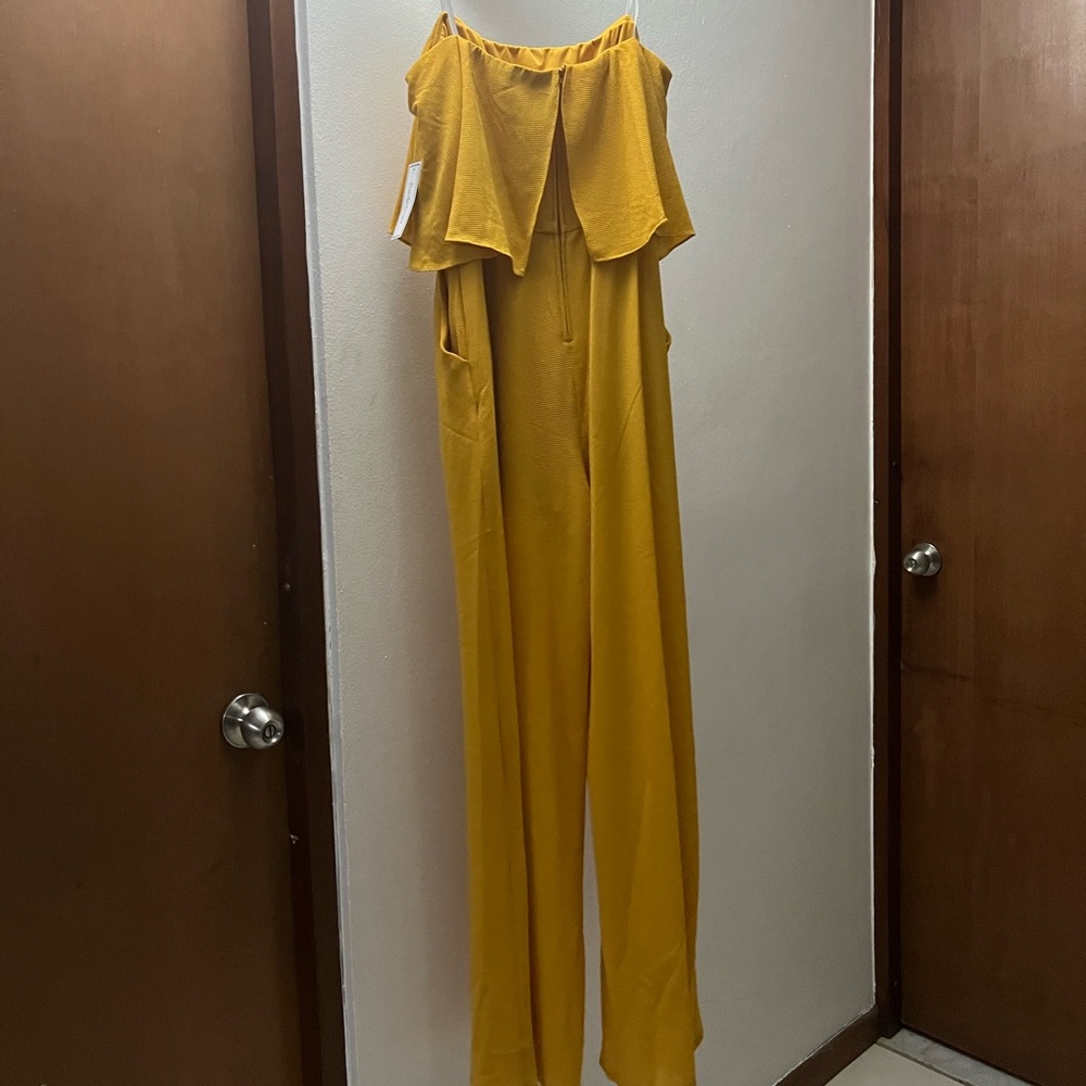 Mustard yellow new jumpsuit.  New with tags. Size: 12